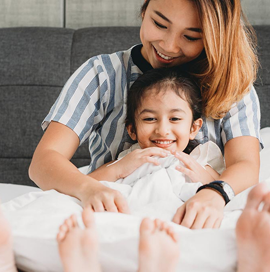 Mother and child smiling